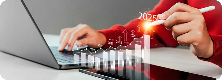 Mulher usando notebook, gráfico mostra crescimento das ações de Trade Marketing em 2025